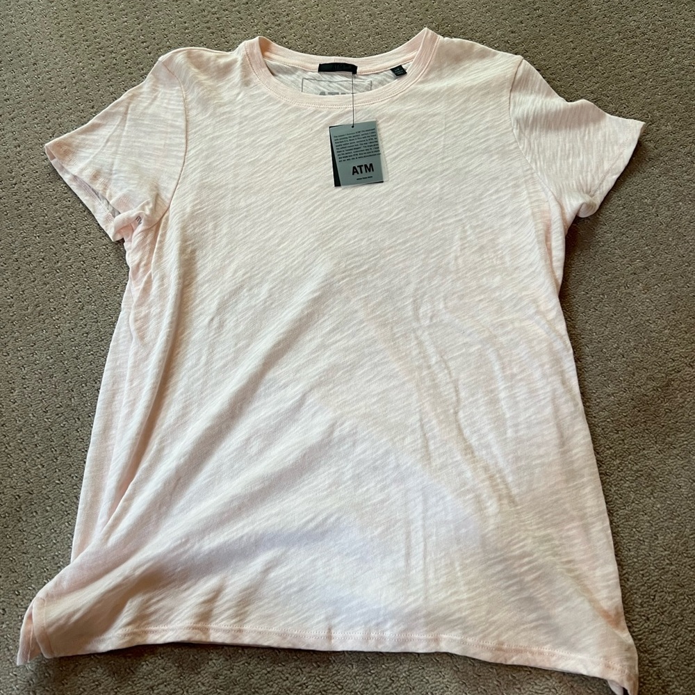 A light pink Tee